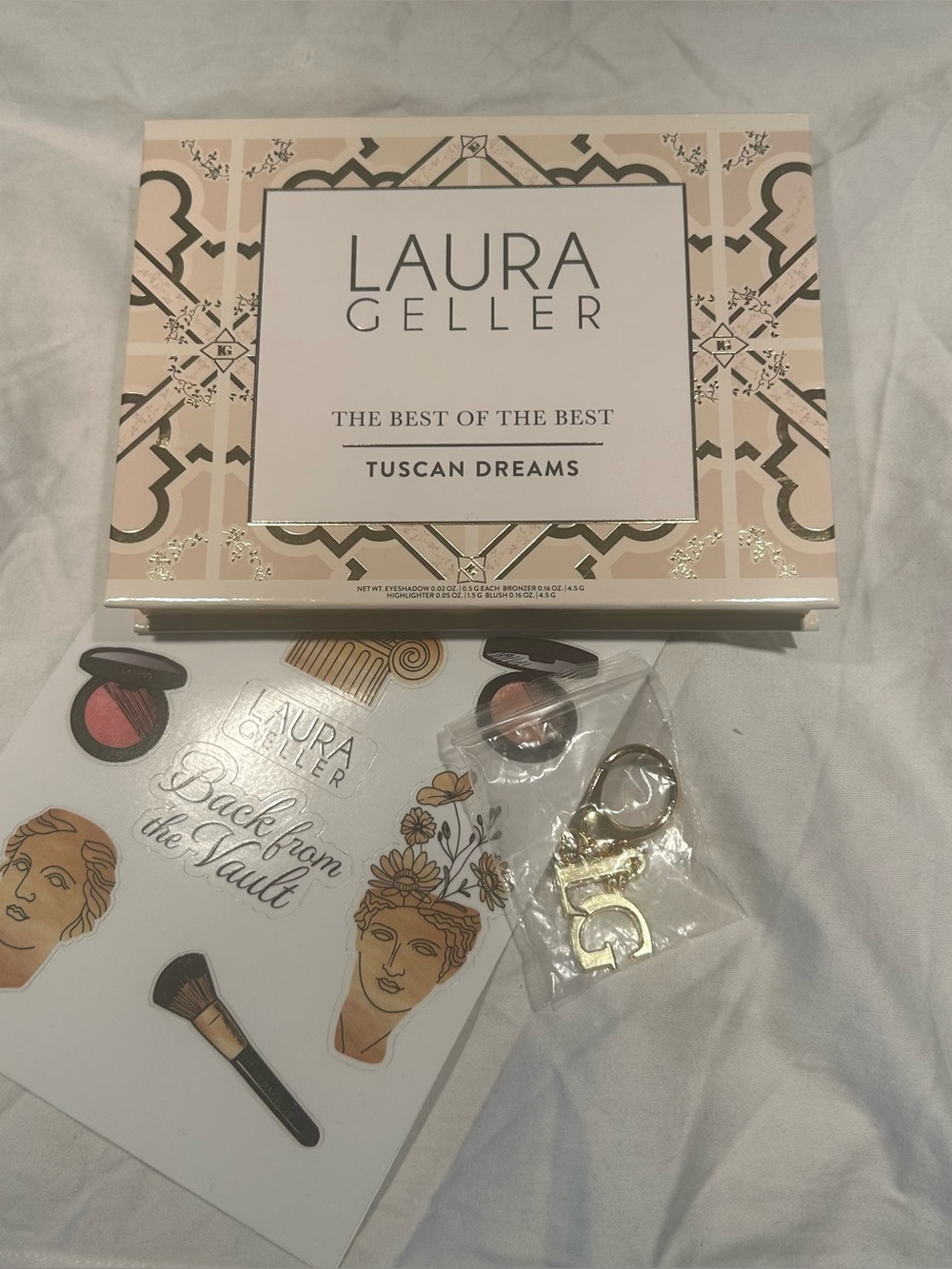 Laura Geller the best of the best Tuscan dreams , branded keychain , & stickers